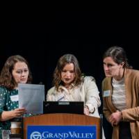 Event coordinators checking a/v system